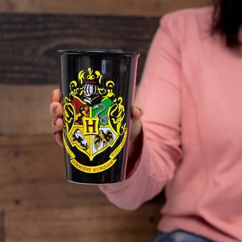 Seven20 Hogwarts mug in use; steaming coffee ready for cozy mornings.