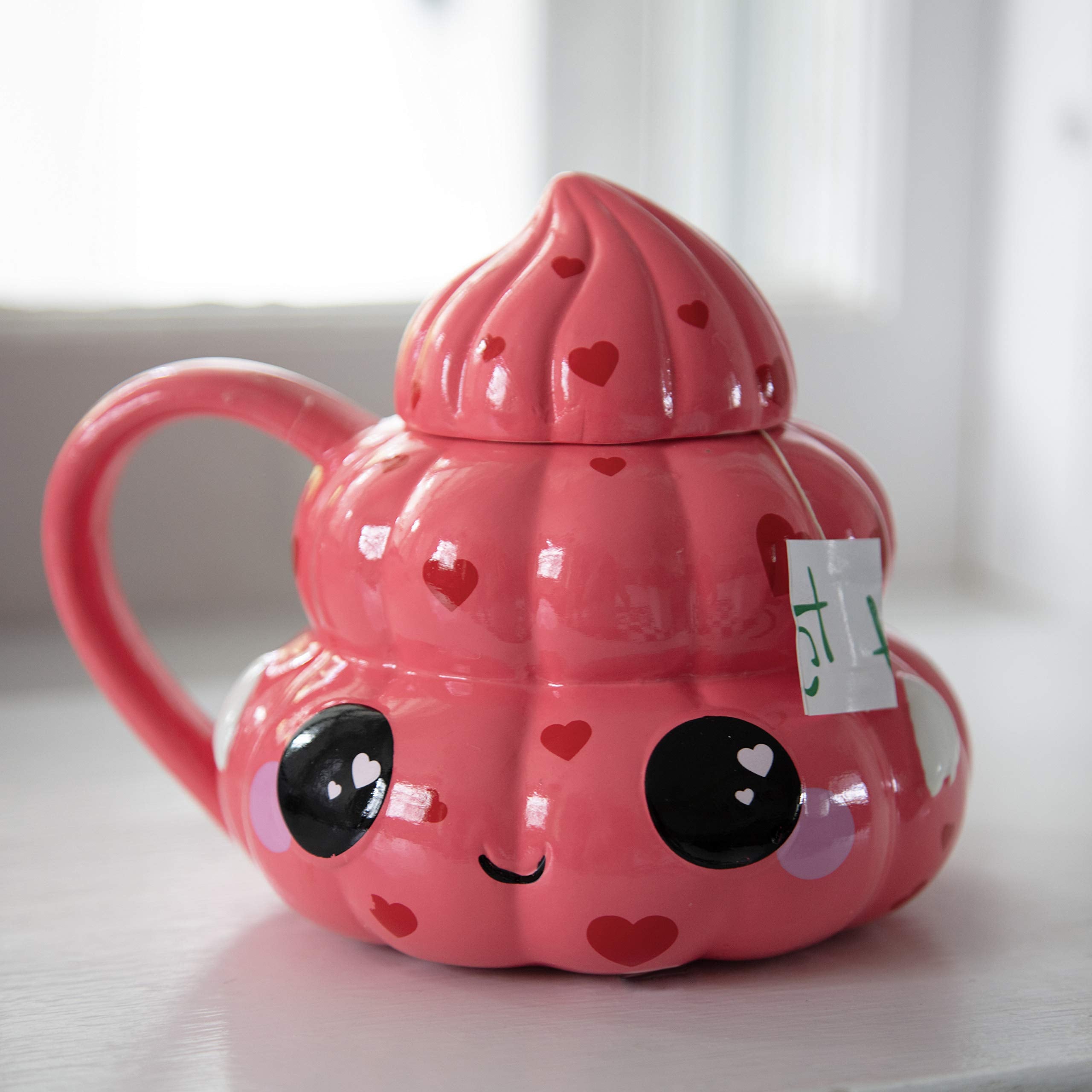 Seven20 Poop Emoji mug with lid, pink hearts swirl, ideal for tea and coffee rituals.