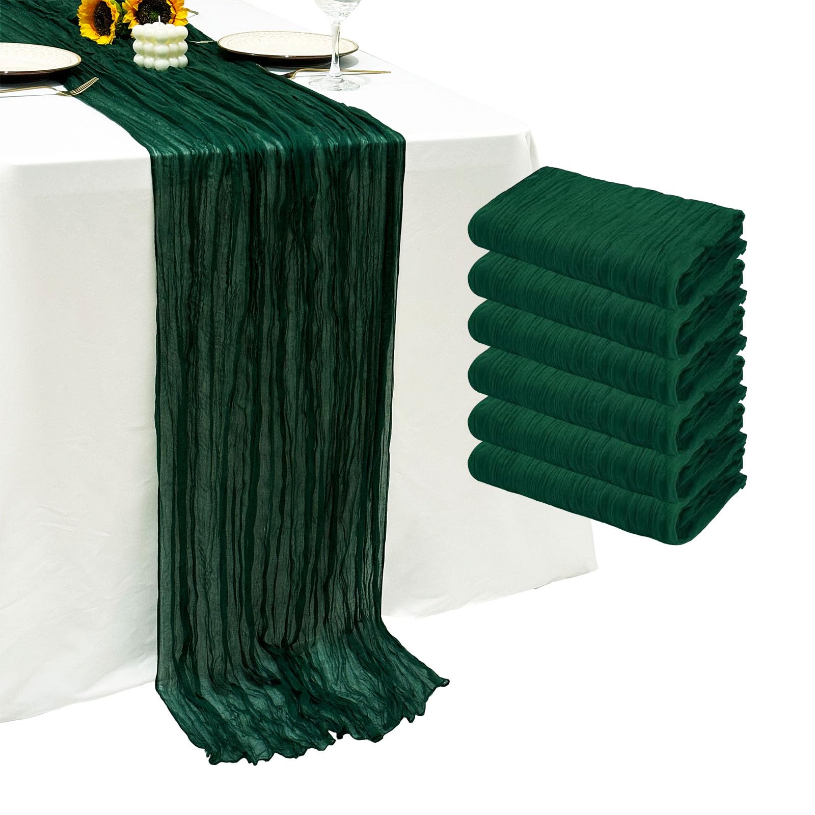 Seveups emerald green cheesecloth runner laid out on a long table for wedding decor