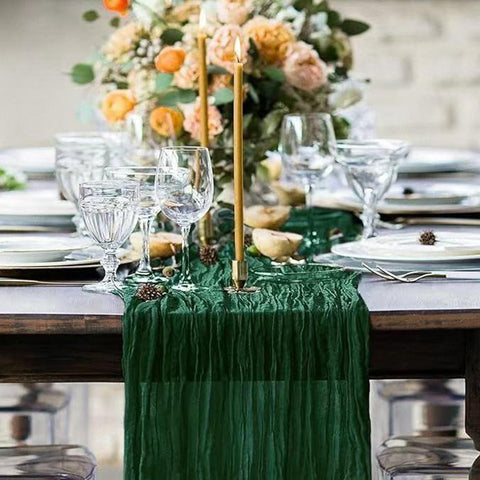 Dessert table display enhanced by Seveups emerald green cheesecloth runner
