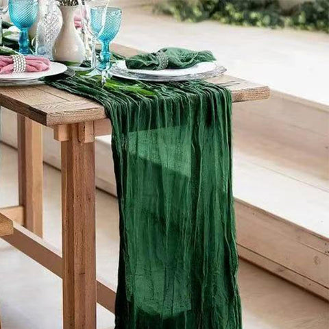 Edge and stitching detail of Seveups emerald green cheesecloth runner