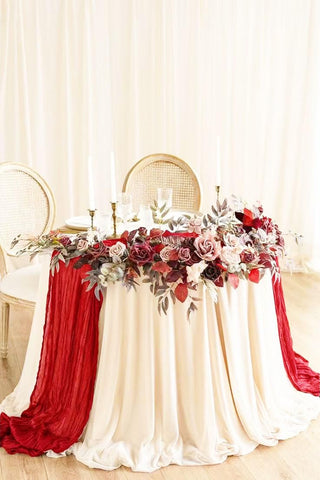 Seveups red cheesecloth runner with gauze texture creates romantic wind-swayed decor.