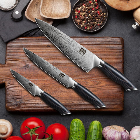 SHAN ZU chef and santoku knives in action with vegetables.