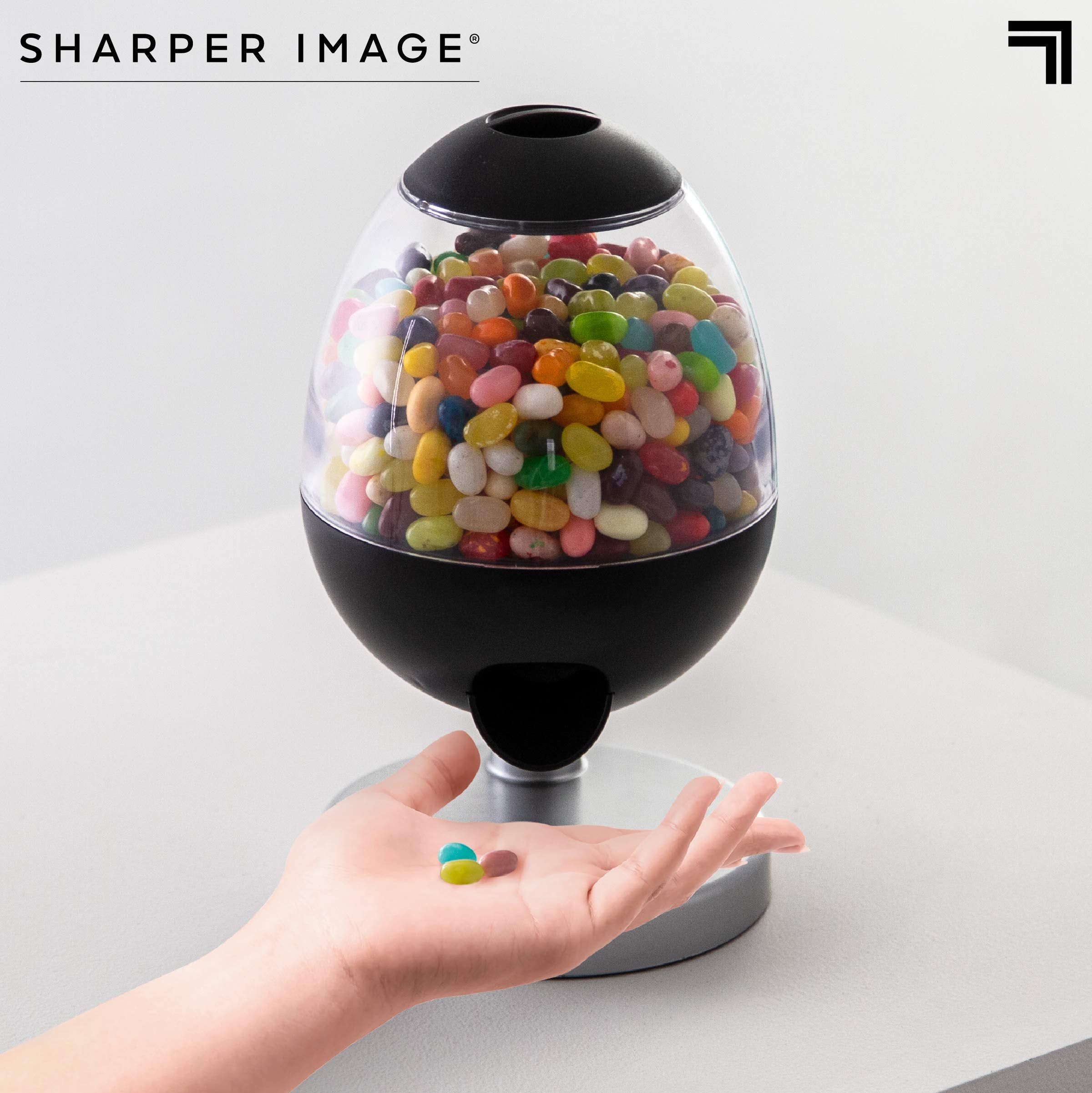 Sharper Image mini dispenser holds 0.5 liter for small snacks.
