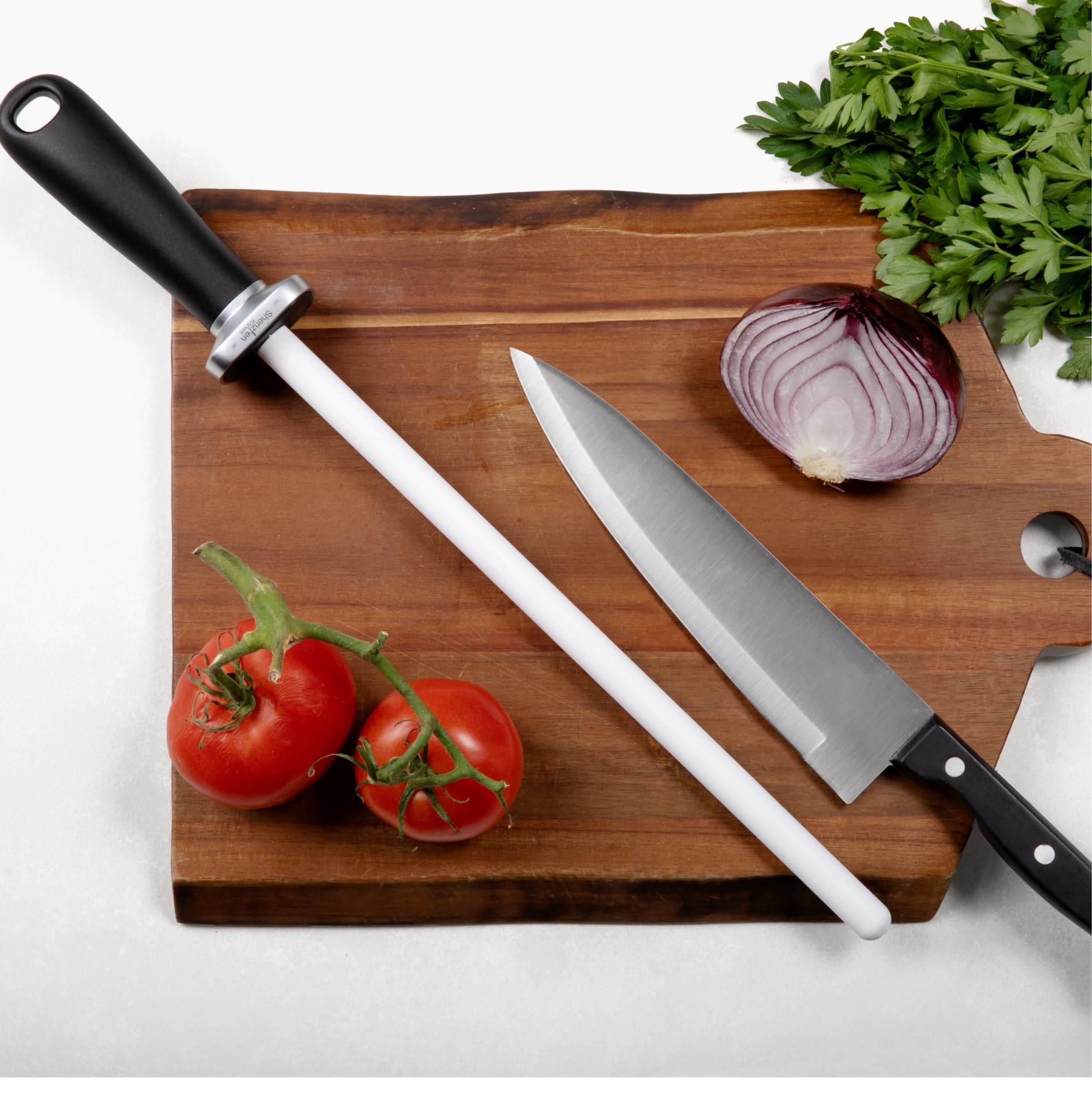 Shenzhen Knives demonstration of edge refinement on a stainless knife.