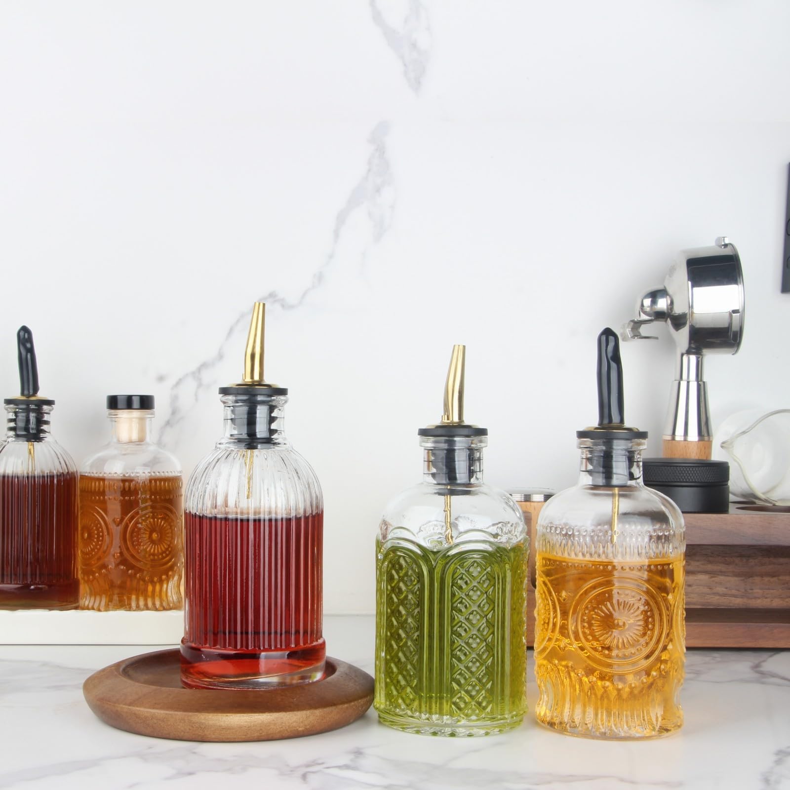 Shining Craft bottles in use for pre-mixed cocktails and syrups at home.