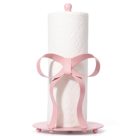Shinlar pink bow paper towel holder on counter adds chic decor and practicality.