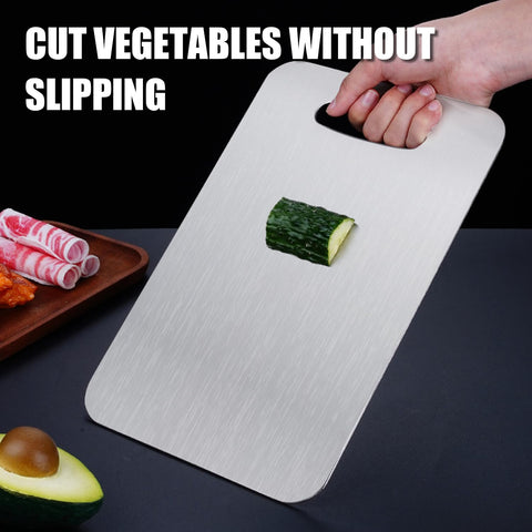 Shiria titanium cutting board smooth surface cleans quickly after prep.