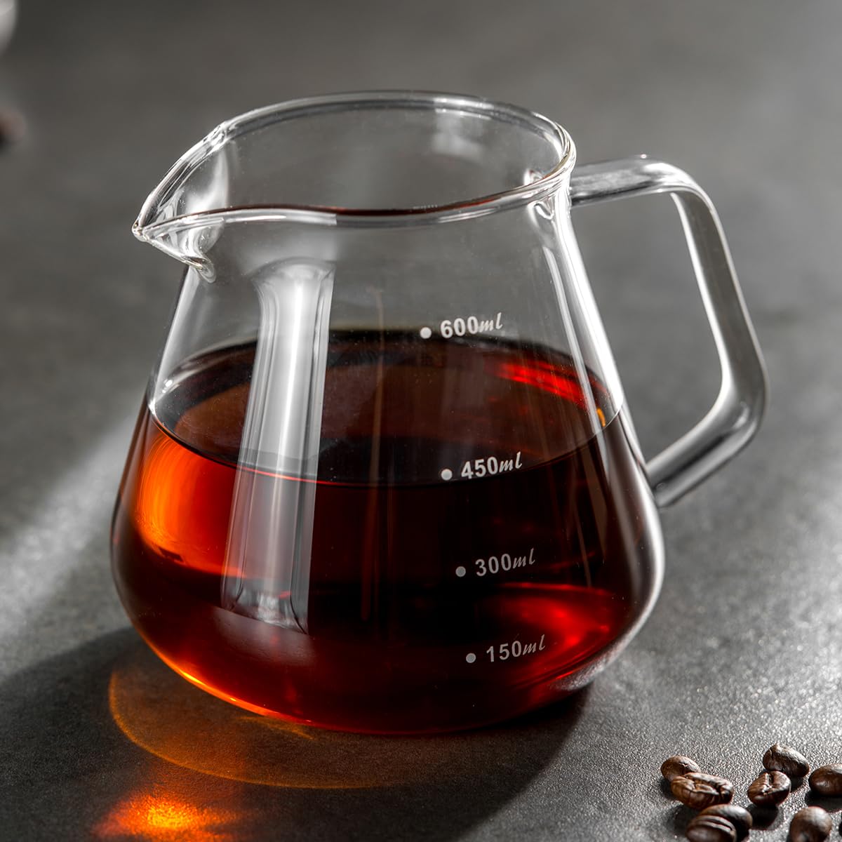 Shoxil bamboo handle close-up shows comfortable grip during pouring.