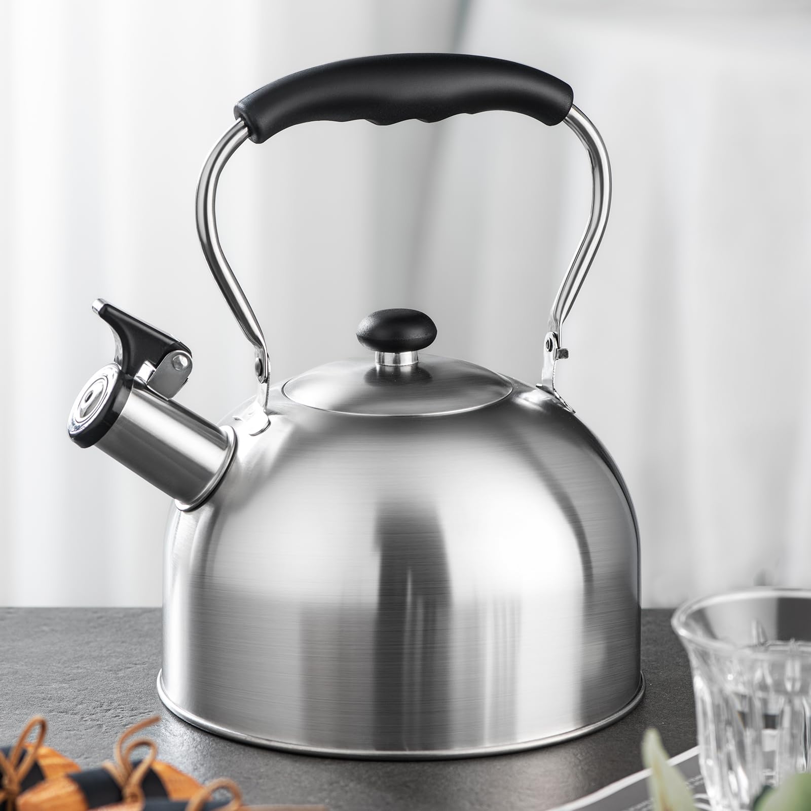 Shoxil whistling tea kettle foldable handle ready for compact storage.