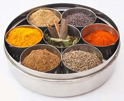 Shradha Trading seven cup spice box setup ideal for chefs and homes.