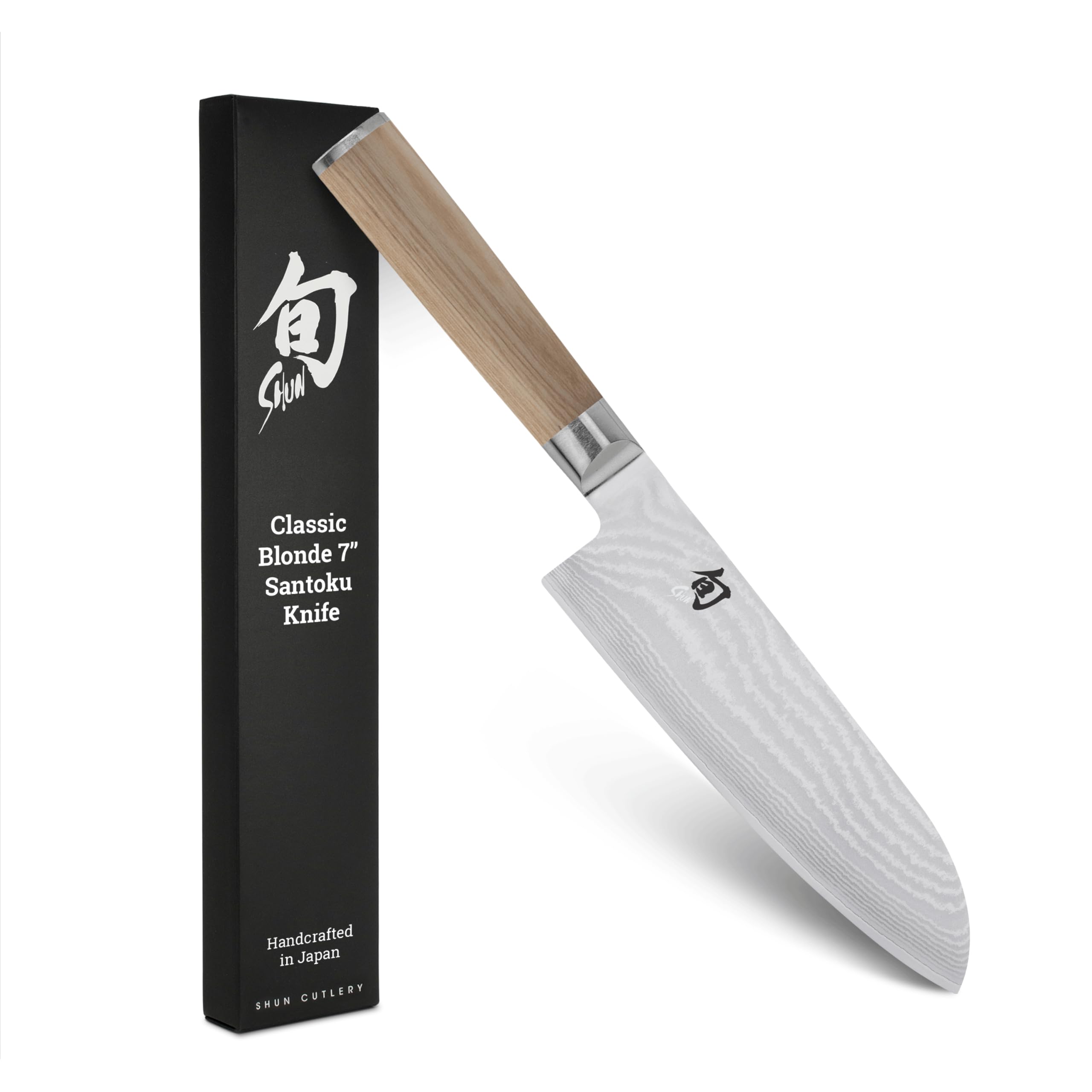 Shun Classic Blonde Santoku blade exposing VG-MAX core for precise vegetable cuts.