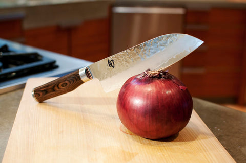 Shun Premier blade reveals VG-MAX Damascus core and layered finish.