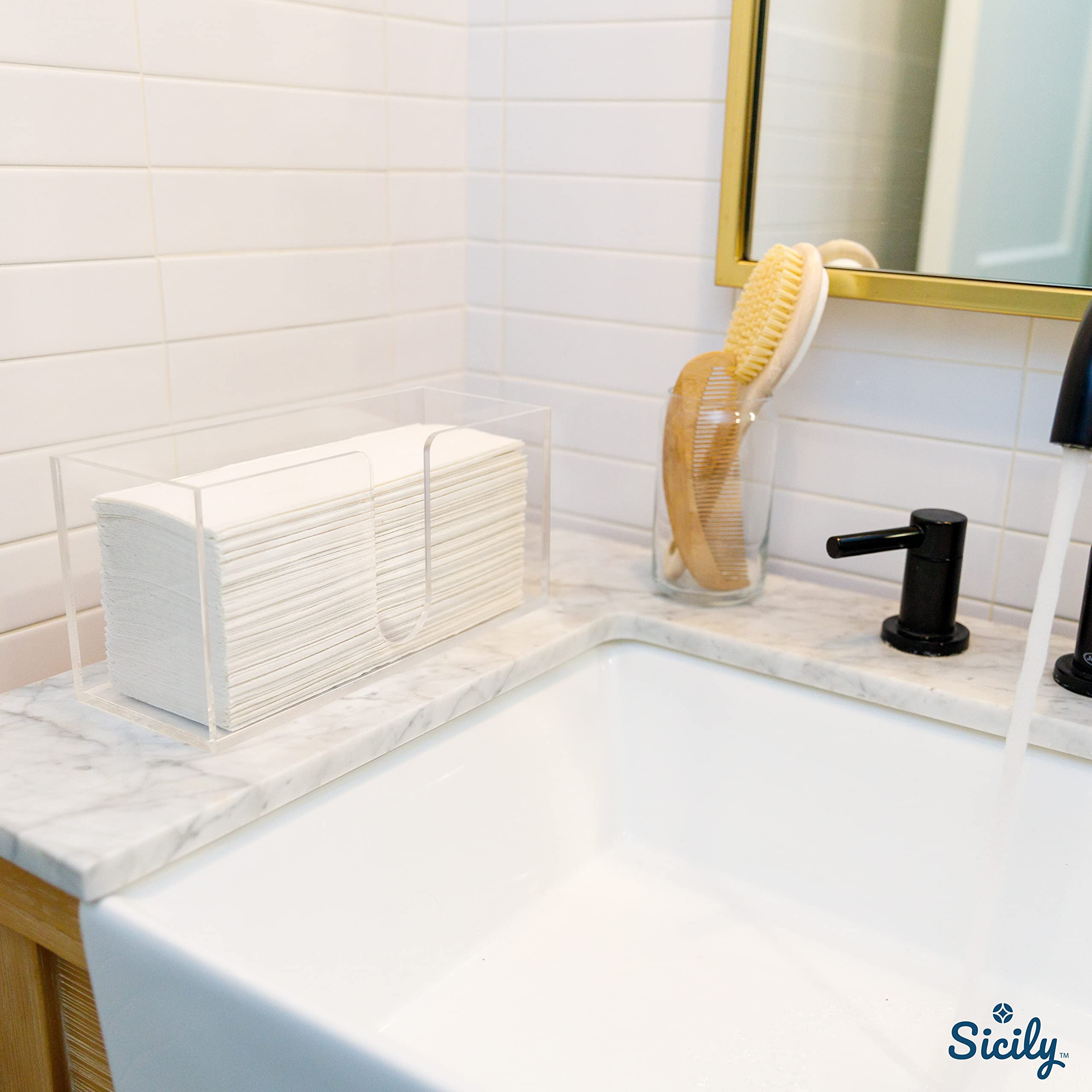 Sicily crystal-clear dispenser showcases multi-fold towels with a clean aesthetic.