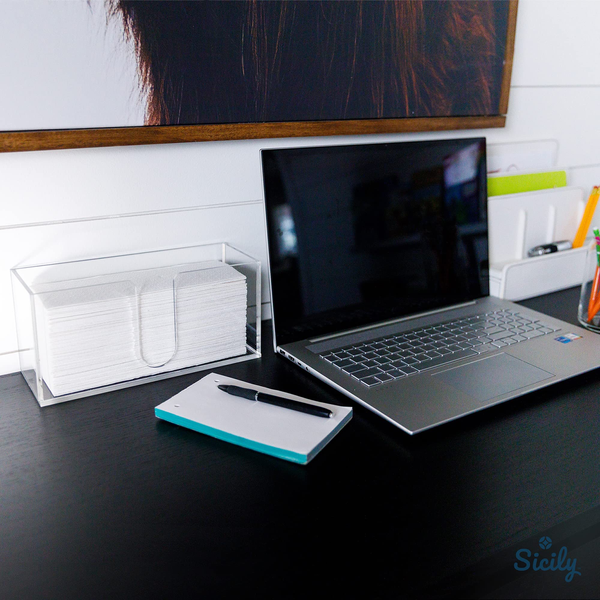 Sicily acrylic paper towel holder on a kitchen counter for quick towel reach.