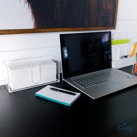 Sicily acrylic paper towel holder on a kitchen counter for quick towel reach.