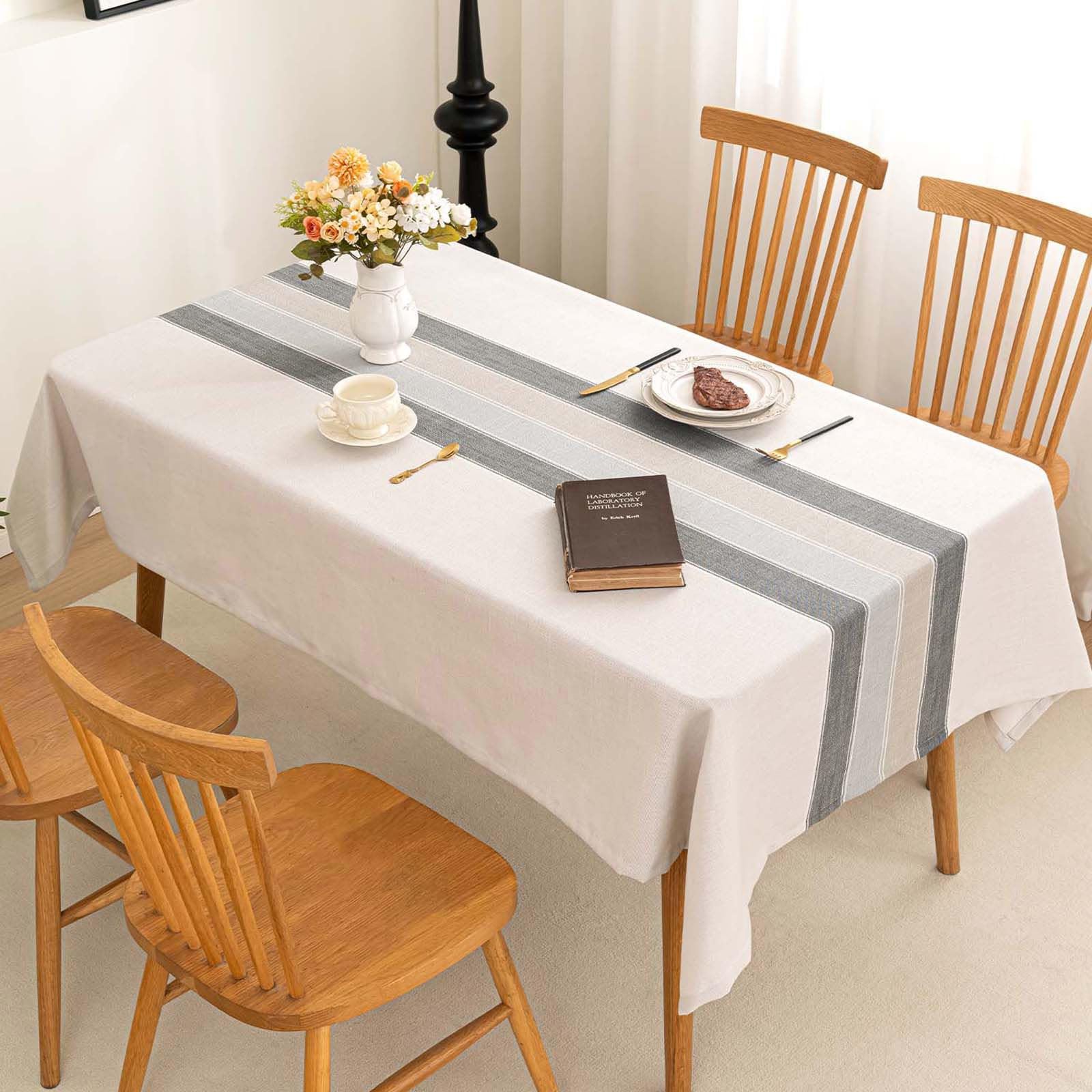 SIELUNO waterproof coating tablecloth showing stain-resistance and easy wipe-clean capability.