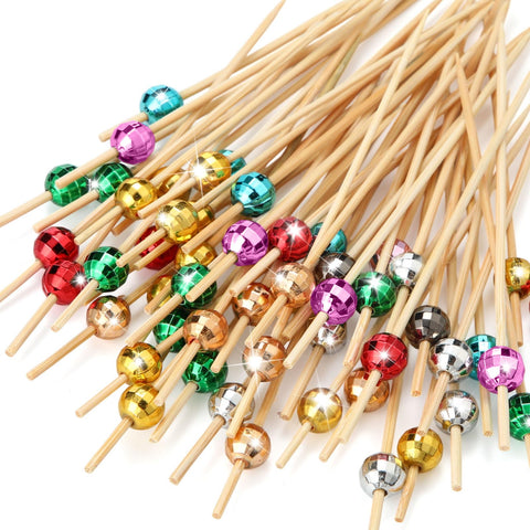 Sieral bamboo skewers with disco ball tops for party decor