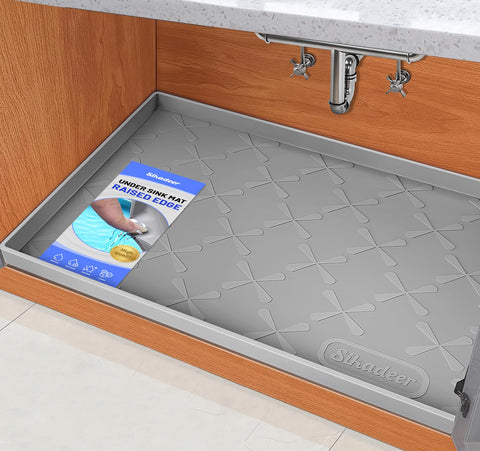 SIKADEER under-sink mat protects cabinets from spills and stains.