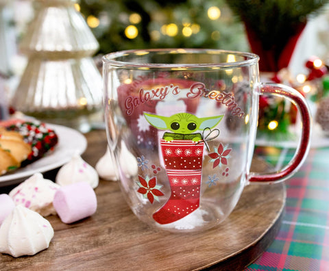 Silver Buffalo Galaxy's Greetings design features a red glitter handle for festive drinks.