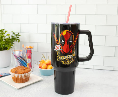 Silver Buffalo Deadpool tumbler fits standard cup holders for car use.