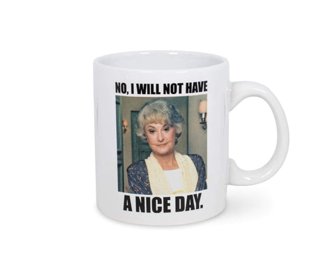 Silver Buffalo mug displaying The Golden Girls logo for collectible licensed decor.