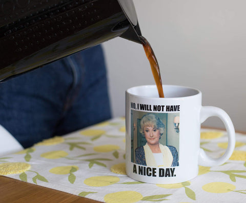 Microwave-safe ceramic mug suitable for quick heating.
