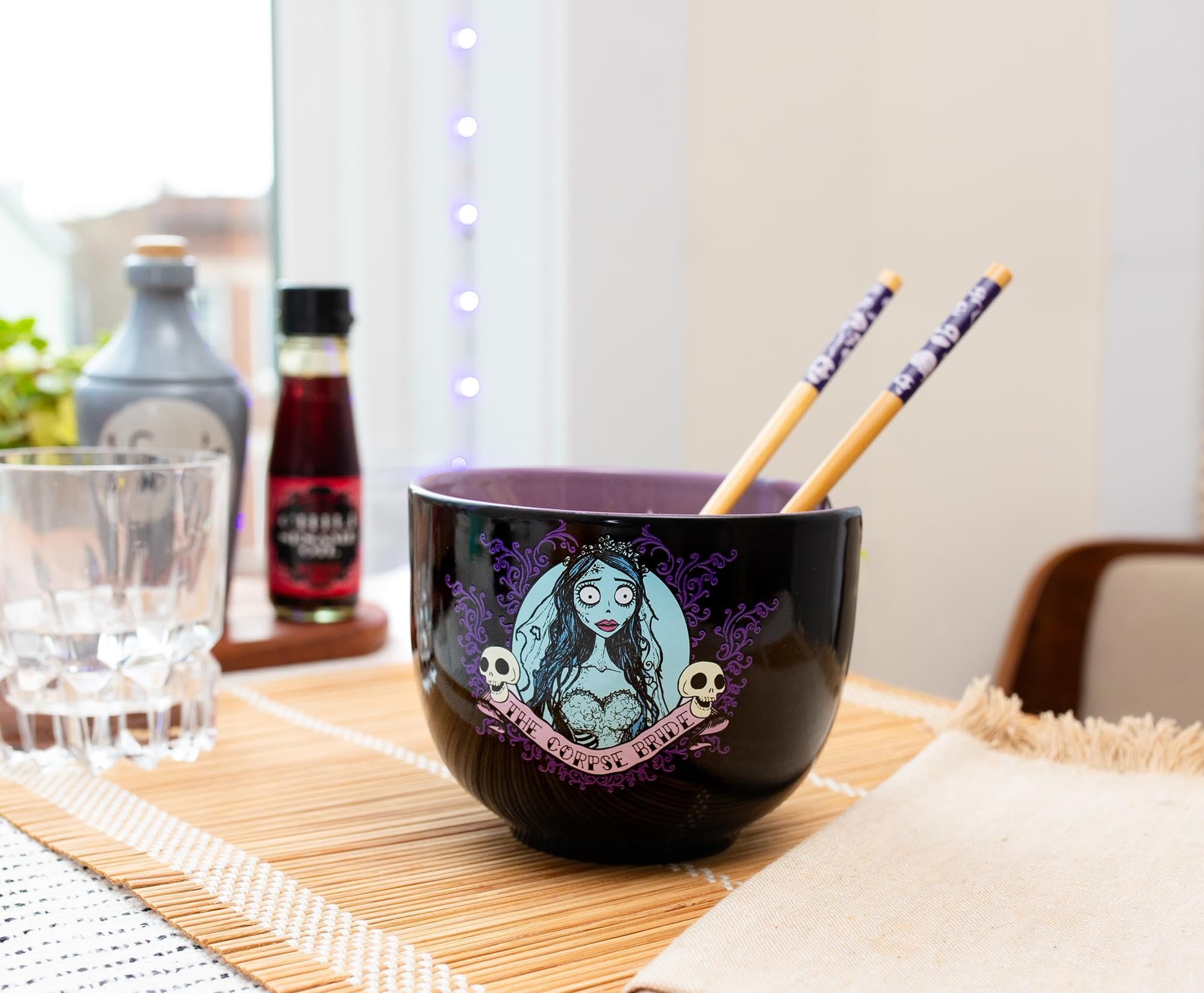 Silver Buffalo gothic blue and purple details evoke Tim Burton-inspired ambiance during dining.