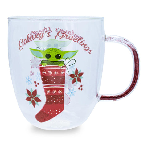 Silver Buffalo Mandalorian mug with Grogu peeking from a stocking, perfect for Star Wars fans.