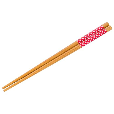 Silver Buffalo Hello Kitty chopsticks with red polka dots, ideal for sushi nights.