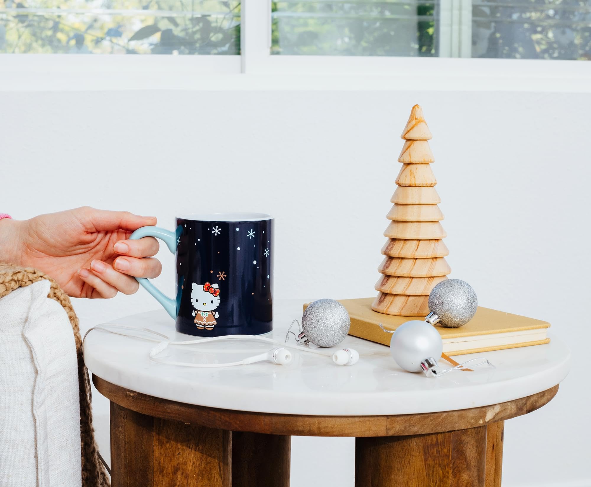 Hello Kitty holiday party mug by Silver Buffalo for seasonal celebrations.