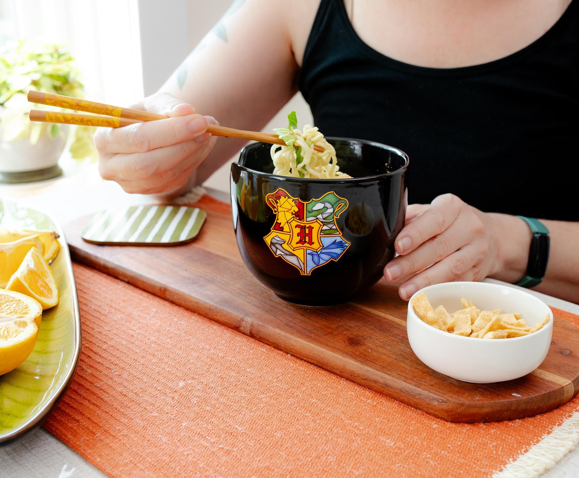 Silver Buffalo Hogwarts crest colors bring house pride to your dinner table.