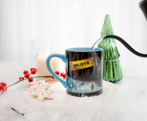 Silver Buffalo Polar Express mug used as festive desk decor.