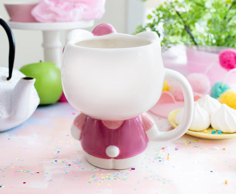 Vibrant pink color enhances the Hello Kitty sculpture for a playful table presence.
