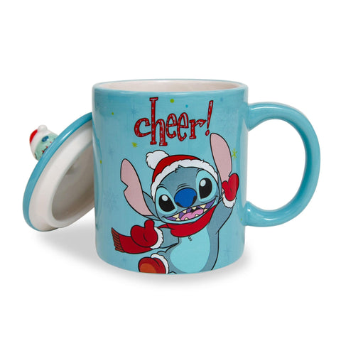 Scrump sits atop the sculpted lid adding playful holiday detail to the mug.