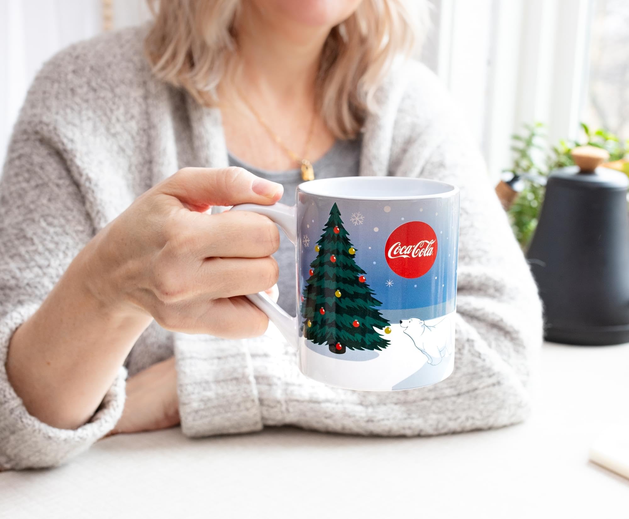 Silver Buffalo winter-wonderland scene mug brightens holiday desk setups.