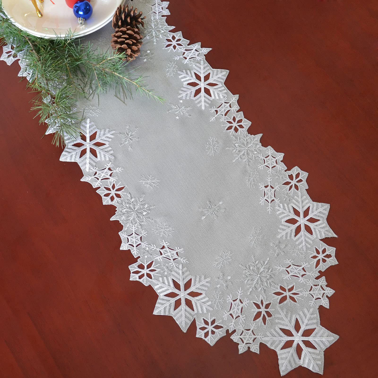 Simhomsen winter table decor embroidery creates a refined, seasonal ambience