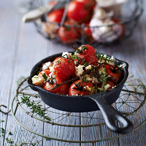 Simple Chef cast iron skillet set demonstrates oven-to-campfire versatility for slow-cooking.