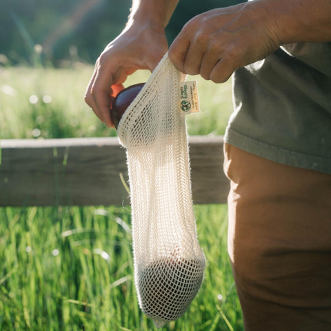 Simple Ecology drawstring bag closeup showing secure closure and breathable fabric.