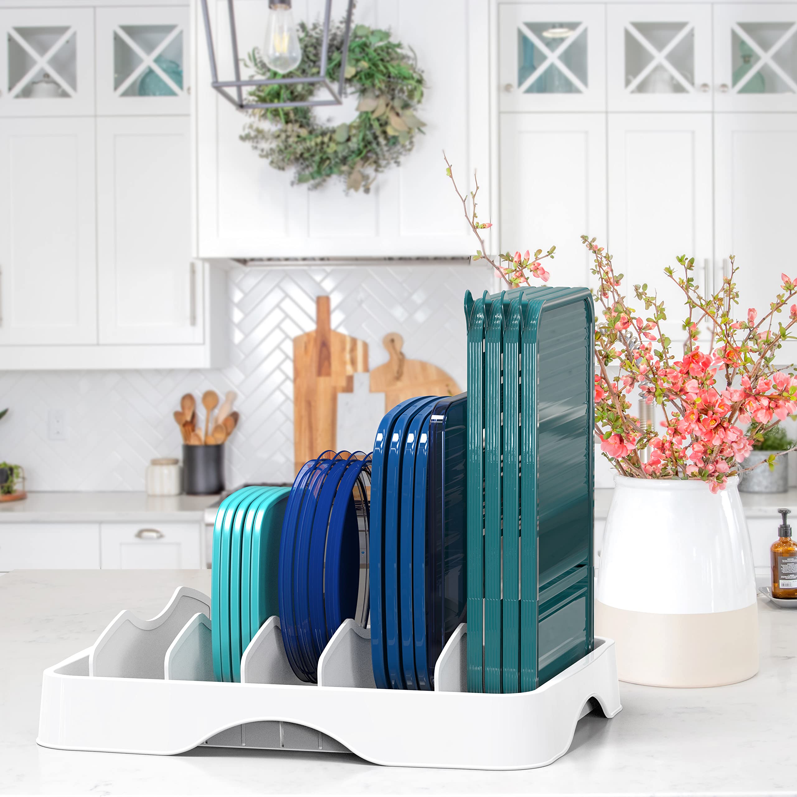 Simple Houseware adjustable dividers illustrate customizable lid slots for multiple sizes