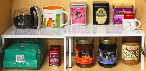 Simple Houseware expandable shelf stacked setup shows dual levels keeping bottles tidy.