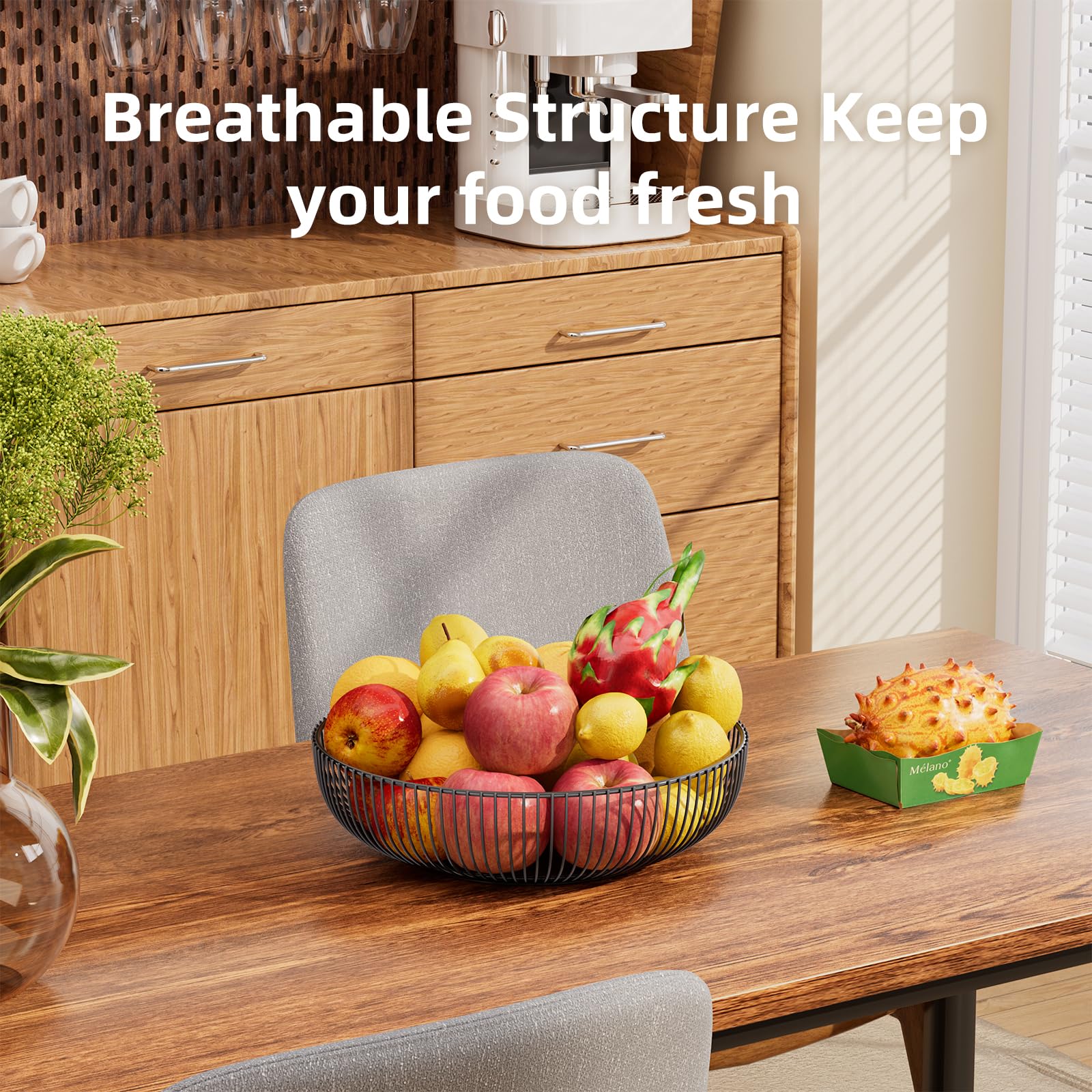 Simple Trending black metal basket on kitchen counter, side view, rust-proof finish.