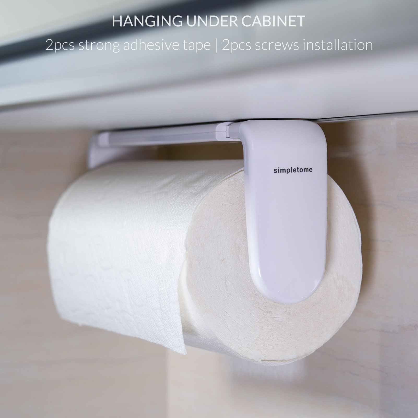 Simpletome adaptive tension arm adjusts to roll size for smooth tearing.