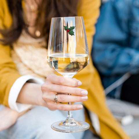 Simply Charmed holiday markers help guests mingle with color-coded drinks.