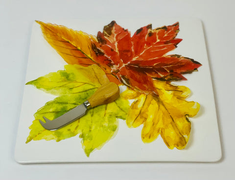 Sisson Distribution leaves arranged with fresh fruit on a rustic board for entertaining.