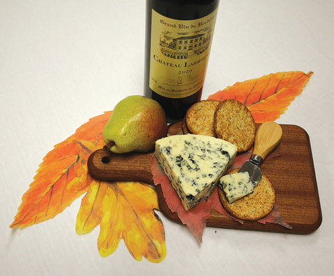 Sisson Distribution artist leaves centerpiece for a festive tablescape.