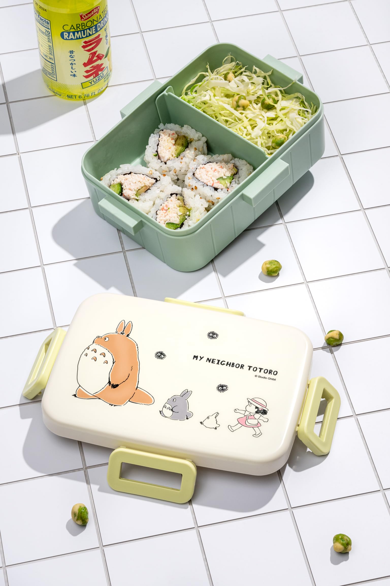 Skater Totoro Bento featuring a secure 4-point lid prevents spills during travel.