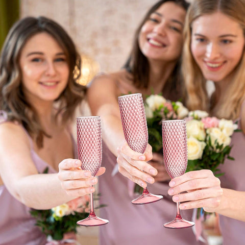 SKLENICE pink reusable champagne glasses reduce waste and simplify cleanup.
