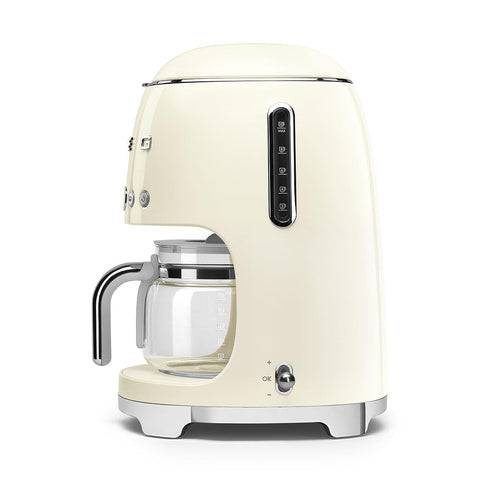 Smeg 50's retro drip coffee machine glass carafe in cream ready to pour