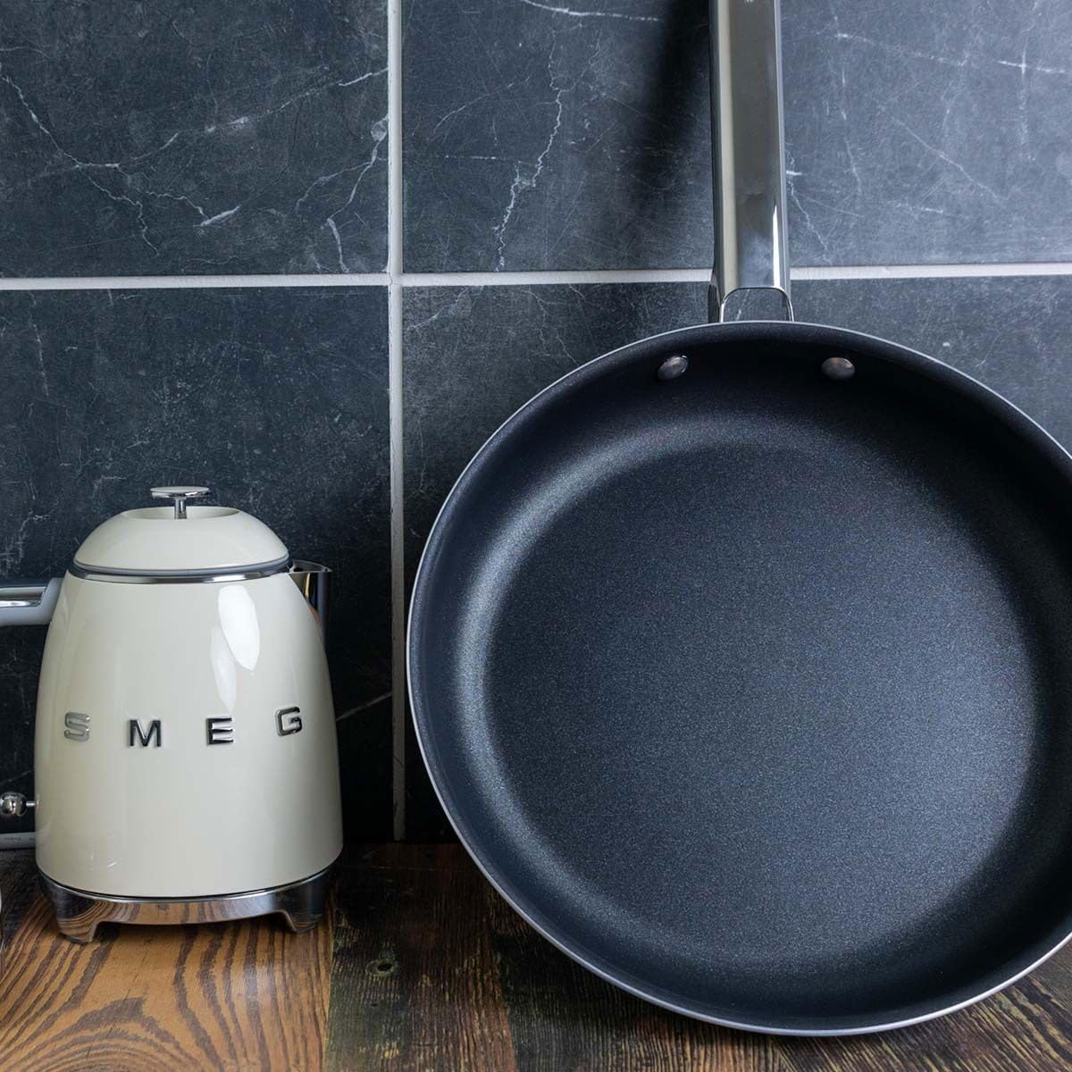 Smeg KLF03CRUS cream kitchen scene featuring retro styling and easy-to-read water indicator.